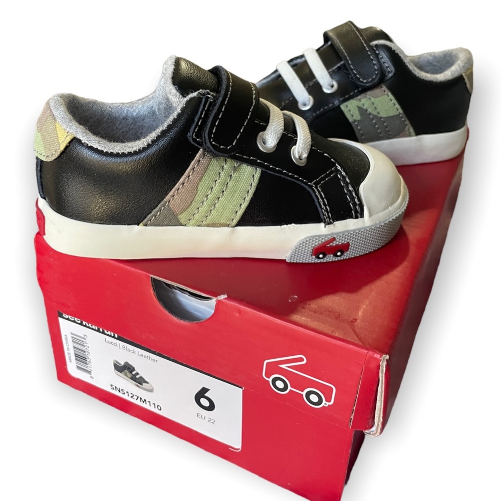 See Kai Run camo and black leather lucci pull on sneakers